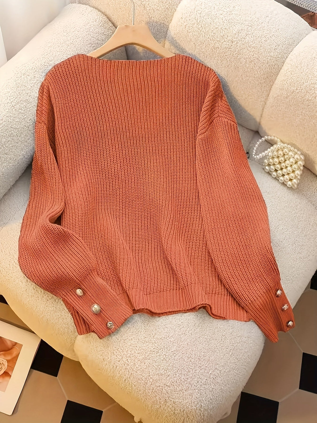 Bettina V-neck sweater flat lay - Orange Red