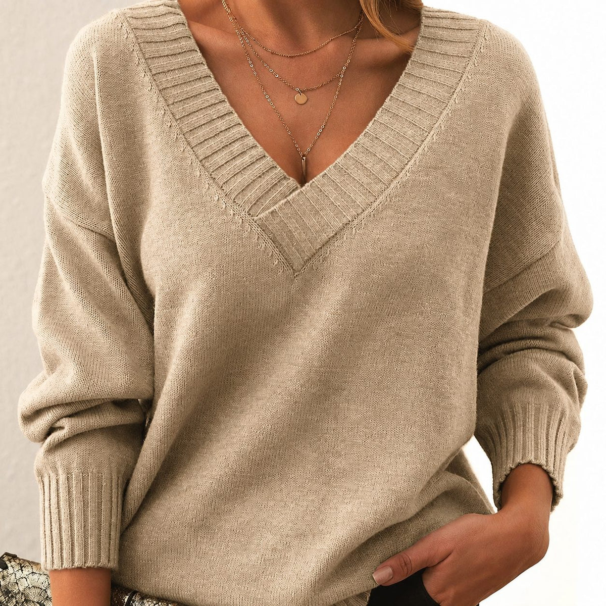 Women's beige V-neck pullover sweater front view