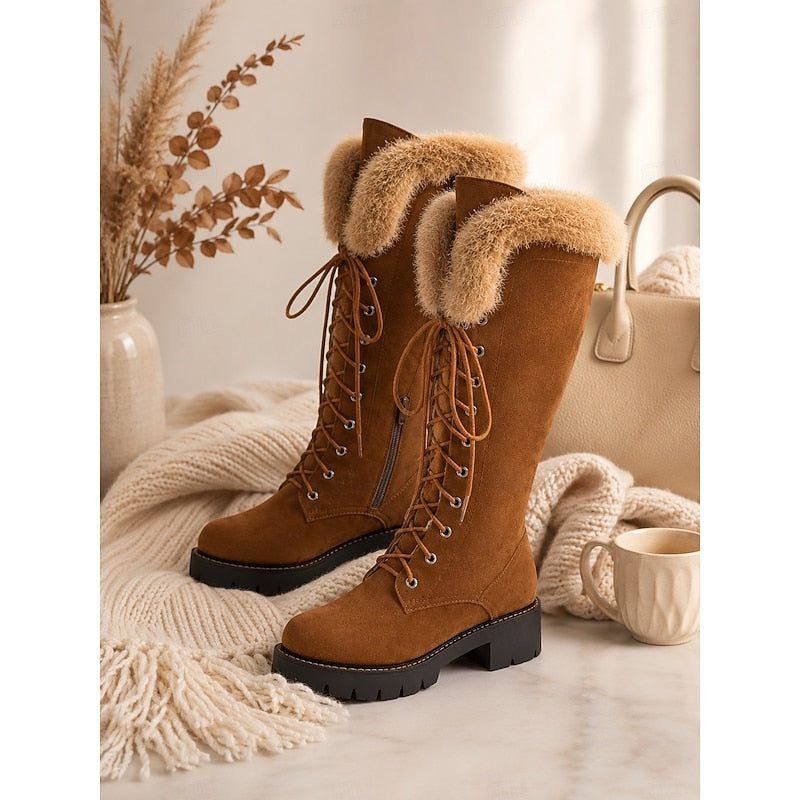Camel lace-up knee-high platform boots styled indoors