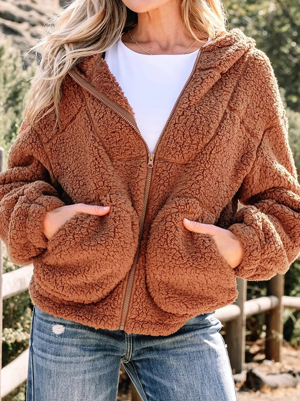 Women's brown oversized hooded teddy zip-up jacket, front view