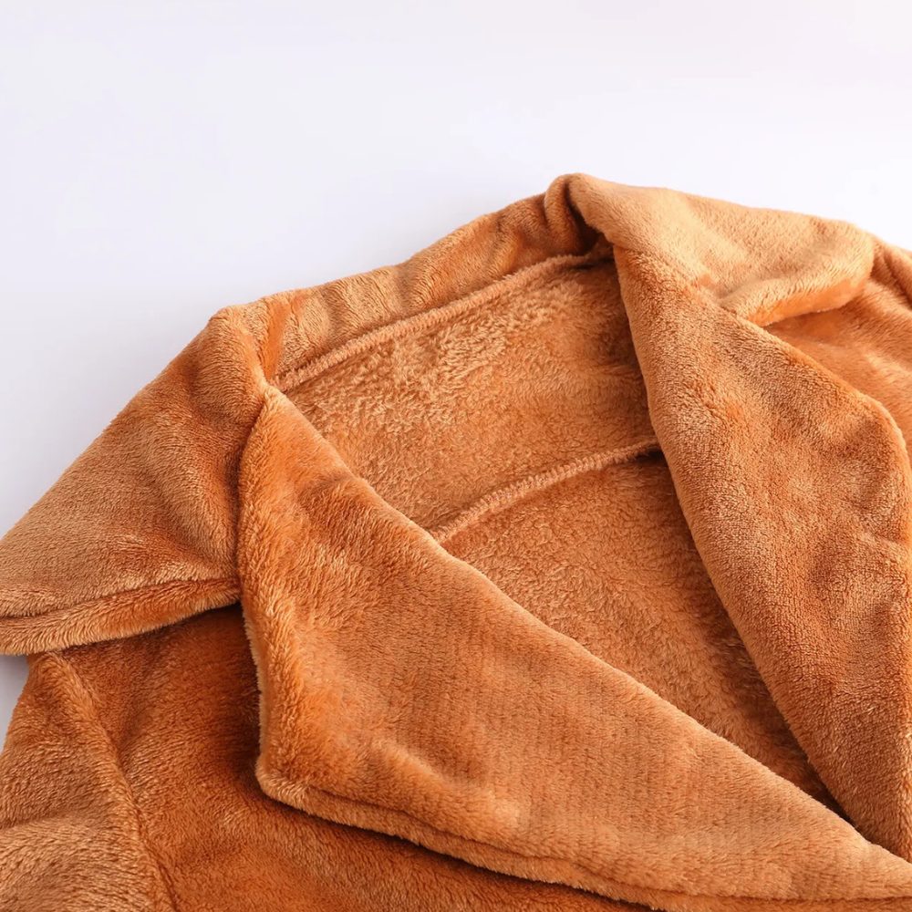 Close-up of collar construction on women's brown plush coat