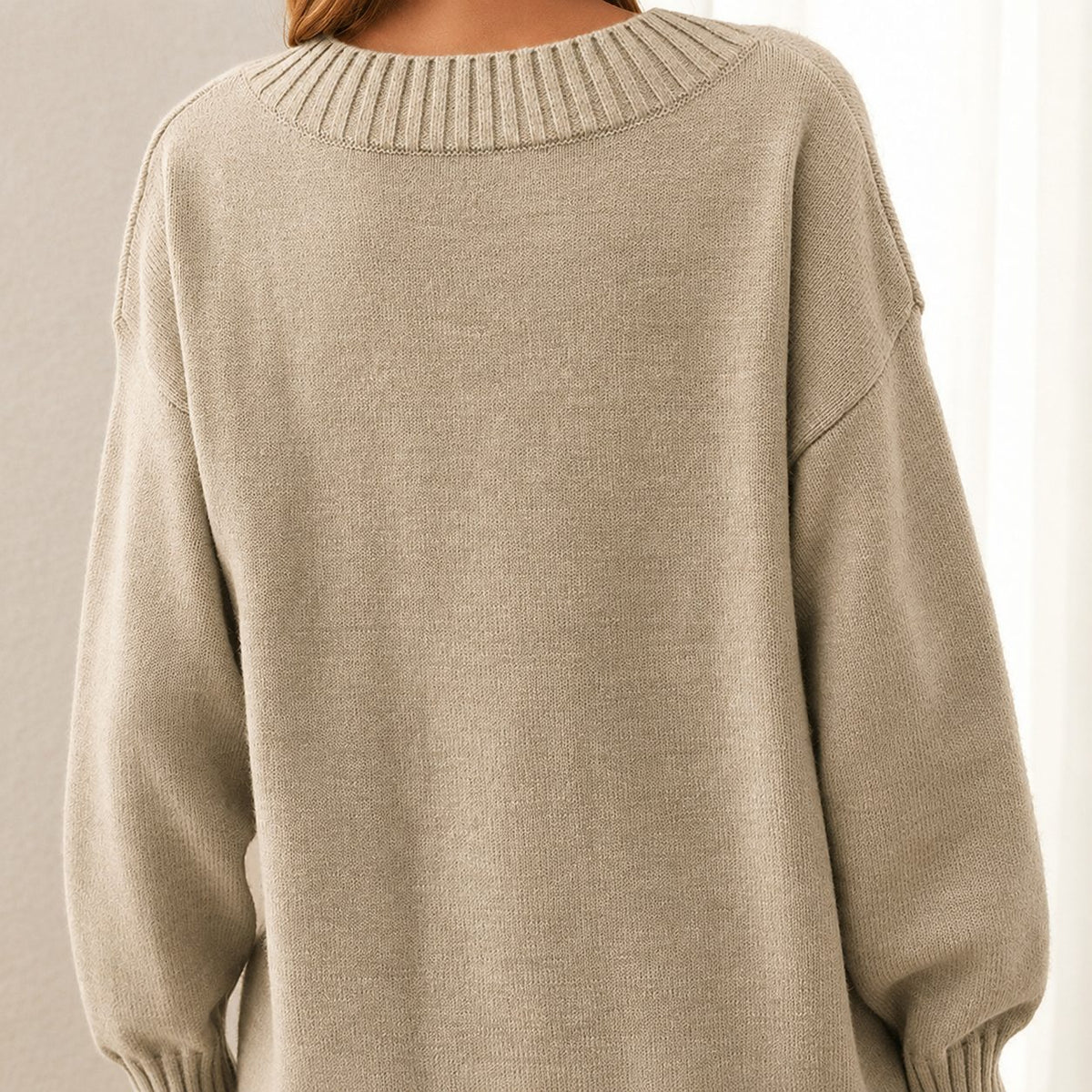 Women's beige relaxed sweater back view