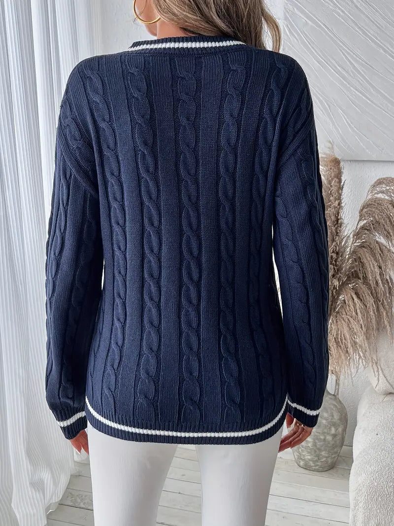 Women's navy cable knit sweater back view